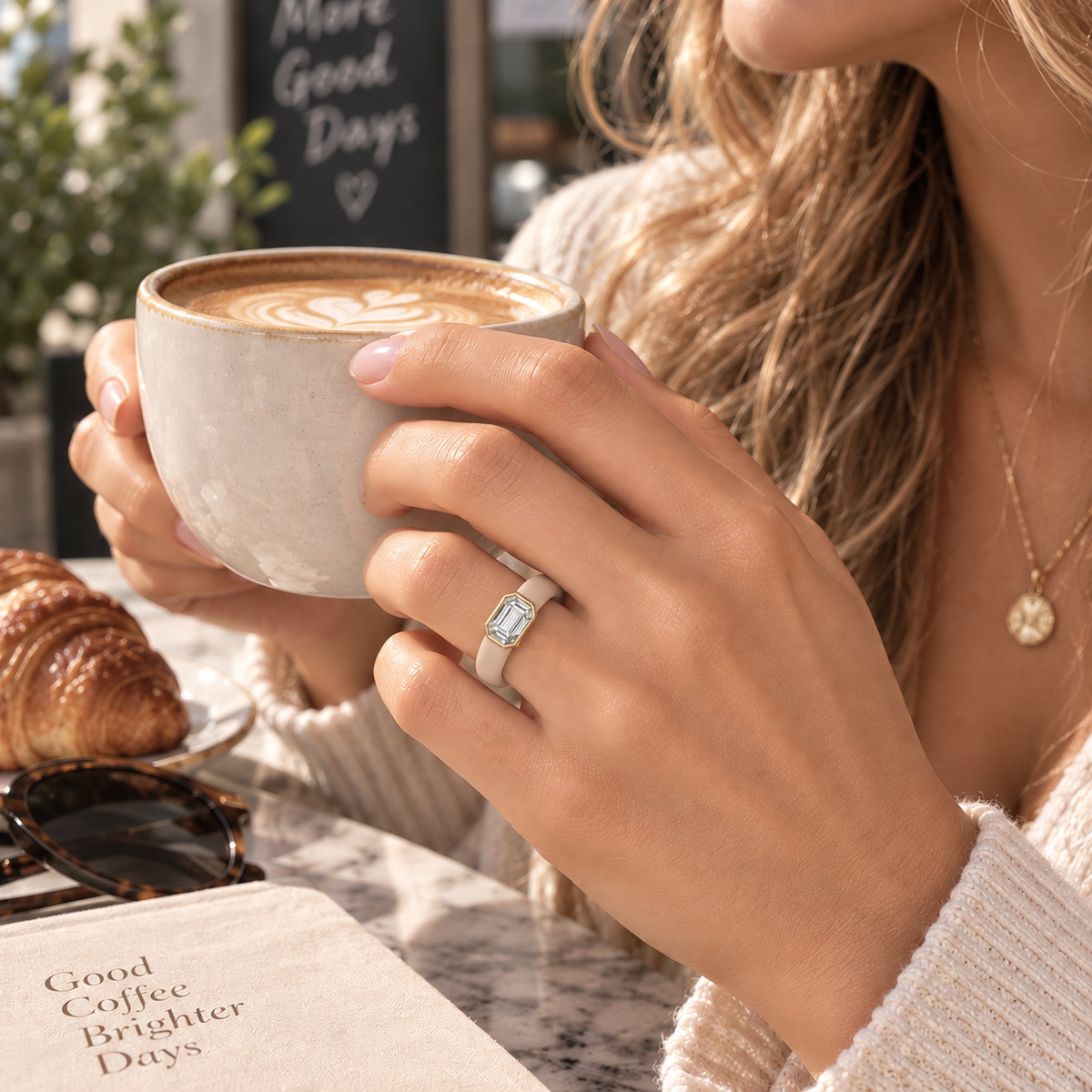 0.5ct Emerald Cut Lab-Grown Diamond Silicone Ring Worn on Hand with Coffee - Real Life Fit