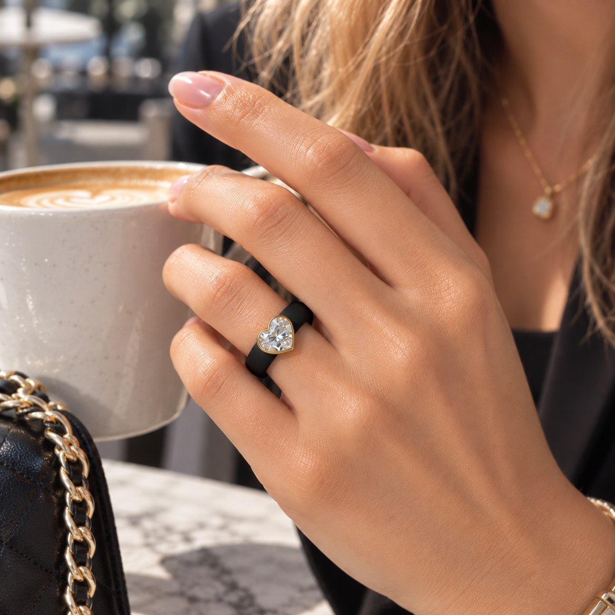 0.5ct Heart Cut Lab-Grown Diamond Silicone Ring Worn on Hand with Coffee - Real Life Fit
