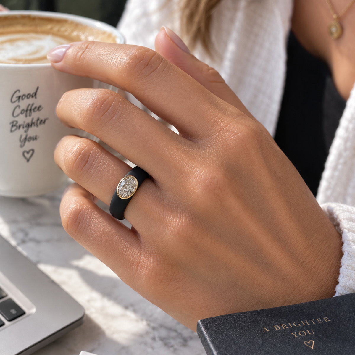 0.5ct Oval Lab Diamond Silicone Ring Worn on Hand with Coffee Cup - Real Life Fit